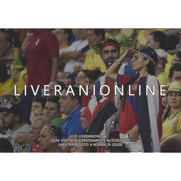 (140629) -- RECIFE, June 29, 2014 () -- Supporters of Costa Rica watch a Round of 16 match between Costa Rica and Greece of 2014 FIFA World Cup at the Arena Pernambuco Stadium in Recife, Brazil, on June 29, 2014.(/Lui Siu Wai)(pcy) ©photoshot/Agenzia Aldo Liverani sas - ITALY ONLY - EDITORIAL USE ONLY - Costa Rica Vs Grecia Coppa del mondo FIFA 2014 allo stadio Arena Pernambuco di Recife, in Brasile, il 29 giugno 2014