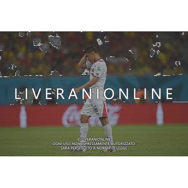 (140629) -- RECIFE, June 29, 2014 () -- Costa Rica\'s Oscar Duarte leaves the pitch after being given a red card during a Round of 16 match between Costa Rica and Greece of 2014 FIFA World Cup at the Arena Pernambuco Stadium in Recife, Brazil, on June 29, 2014.(/Guo Yong)(rh) ©photoshot/Agenzia Aldo Liverani sas - ITALY ONLY - EDITORIAL USE ONLY - Costa Rica Vs Grecia Coppa del mondo FIFA 2014 allo stadio Arena Pernambuco di Recife, in Brasile, il 29 giugno 2014