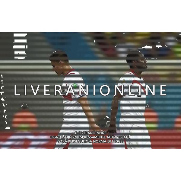 (140629) -- RECIFE, June 29, 2014 () -- Costa Rica\'s Oscar Duarte (L) leaves the pitch after being given a red card during a Round of 16 match between Costa Rica and Greece of 2014 FIFA World Cup at the Arena Pernambuco Stadium in Recife, Brazil, on June 29, 2014.(/Guo Yong)(rh) ©photoshot/Agenzia Aldo Liverani sas - ITALY ONLY - EDITORIAL USE ONLY - Costa Rica Vs Grecia Coppa del mondo FIFA 2014 allo stadio Arena Pernambuco di Recife, in Brasile, il 29 giugno 2014