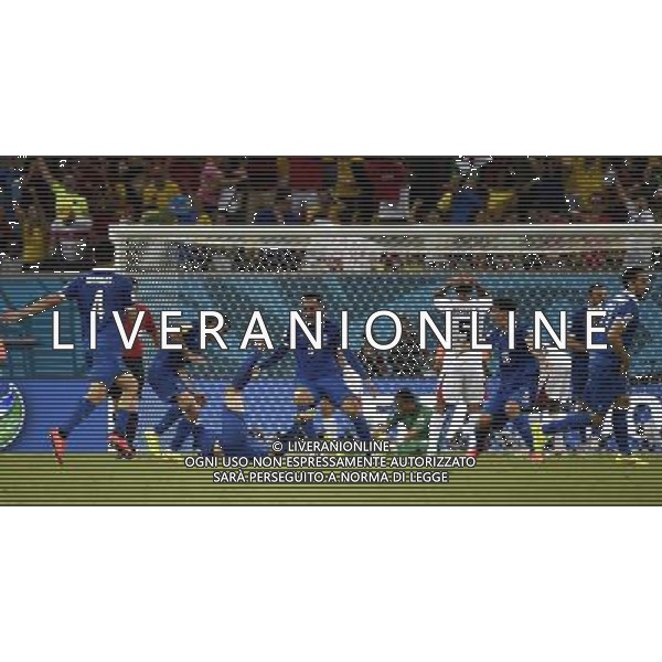 (140629) -- RECIFE, June 29, 2014 () -- Greece\'s Sokratis Papastathopoulos (bottom) celebrates a goal with his teammates during a Round of 16 match between Costa Rica and Greece of 2014 FIFA World Cup at the Arena Pernambuco Stadium in Recife, Brazil, on June 29, 2014.(/Lui Siu Wai)(pcy) ©photoshot/Agenzia Aldo Liverani sas - ITALY ONLY - EDITORIAL USE ONLY - Costa Rica Vs Grecia Coppa del mondo FIFA 2014 allo stadio Arena Pernambuco di Recife, in Brasile, il 29 giugno 2014