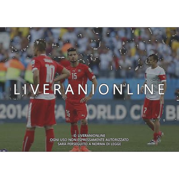 (140701) -- SAO PAULO, July 1, 2014 () -- Switzerland\'s Blerim Dzemaili (C) reacts after a Round of 16 match between Argentina and Switzerland of 2014 FIFA World Cup at the Arena de Sao Paulo Stadium in Sao Paulo, Brazil, on July 1, 2014. Argentina won 1-0 over Switzerland after 120 minutes and qualified for quarter-finals on Tuesday. (/Wang Lili)(pcy) ©photoshot/Agenzia Aldo Liverani sas - ITALY ONLY - EDITORIAL USE ONLY - Argentina - Svizzera Coppa del Mondo FIFA 2014 allo stadio Arena di Sao Paulo, in Brasile, 1 ° luglio 2014