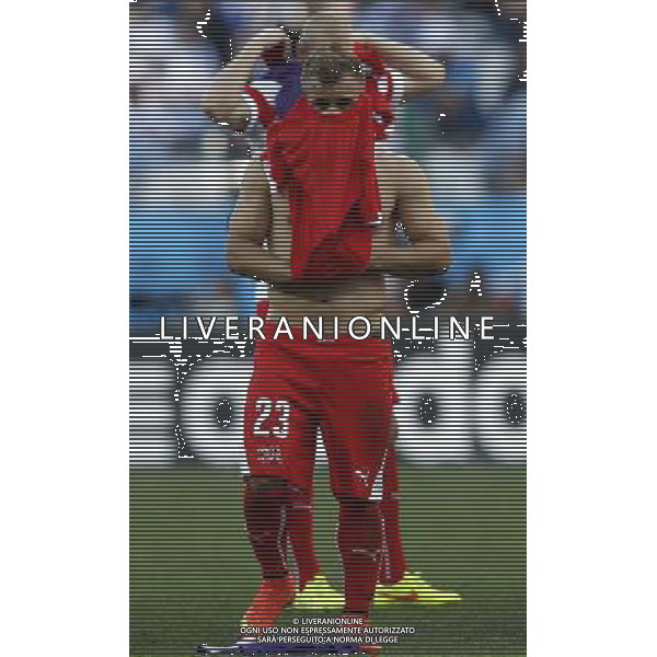 (140701) -- SAO PAULO, July 1, 2014 () -- Switzerland\'s Xherdan Shaqiri reacts after a Round of 16 match between Argentina and Switzerland of 2014 FIFA World Cup at the Arena de Sao Paulo Stadium in Sao Paulo, Brazil, on July 1, 2014. Argentina won 1-0 over Switzerland after 120 minutes and qualified for quarter-finals on Tuesday. (/Wang Lili)(pcy) ©photoshot/Agenzia Aldo Liverani sas - ITALY ONLY - EDITORIAL USE ONLY - Argentina - Svizzera Coppa del Mondo FIFA 2014 allo stadio Arena di Sao Paulo, in Brasile, 1 ° luglio 2014