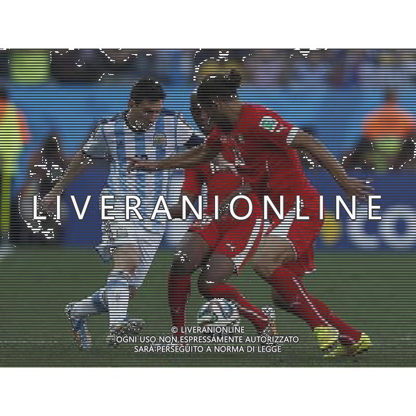 (140701) -- SAO PAULO, July 1, 2014 () -- Argentina\'s Lionel Messi (L) competes during a Round of 16 match between Argentina and Switzerland of 2014 FIFA World Cup at the Arena de Sao Paulo Stadium in Sao Paulo, Brazil, on July 1, 2014. Argentina won 1-0 over Switzerland after 120 minutes and qualified for quarter-finals on Tuesday. (/Wang Lili)(pcy) ©photoshot/Agenzia Aldo Liverani sas - ITALY ONLY - EDITORIAL USE ONLY - Argentina - Svizzera Coppa del Mondo FIFA 2014 allo stadio Arena di Sao Paulo, in Brasile, 1 ° luglio 2014
