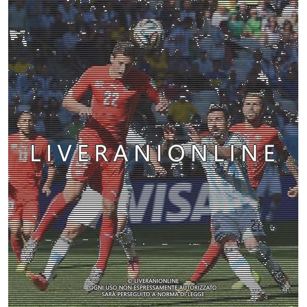 (140701) -- SAO PAULO, July 1, 2014 () -- Switzerland\'s Fabian Schaer (up) jumps for a header during a Round of 16 match between Argentina and Switzerland of 2014 FIFA World Cup at the Arena de Sao Paulo Stadium in Sao Paulo, Brazil, on July 1, 2014.(/Wang Yuguo)(rh) ©photoshot/Agenzia Aldo Liverani sas - ITALY ONLY - EDITORIAL USE ONLY - Argentina - Svizzera Coppa del Mondo FIFA 2014 allo stadio Arena di Sao Paulo, in Brasile, 1 ° luglio 2014