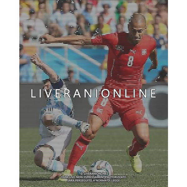 (140701) -- SAO PAULO, July 1, 2014 () -- Argentina\'s Lionel Messi vies with Switzerland\'s Gokhan Inler during a Round of 16 match between Argentina and Switzerland of 2014 FIFA World Cup at the Arena de Sao Paulo Stadium in Sao Paulo, Brazil, on July 1, 2014.(/Xu Zijian)(rh) ©photoshot/Agenzia Aldo Liverani sas - ITALY ONLY - EDITORIAL USE ONLY - Argentina - Svizzera Coppa del Mondo FIFA 2014 allo stadio Arena di Sao Paulo, in Brasile, 1 ° luglio 2014