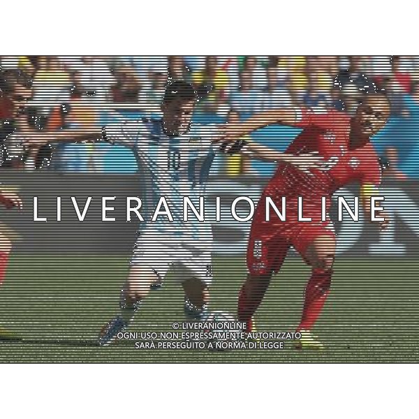 (140701) -- SAO PAULO, July 1, 2014 () -- Argentina\'s Lionel Messi vies with Switzerland\'s Gokhan Inler during a Round of 16 match between Argentina and Switzerland of 2014 FIFA World Cup at the Arena de Sao Paulo Stadium in Sao Paulo, Brazil, on July 1, 2014.(/Xu Zijian)(rh) ©photoshot/Agenzia Aldo Liverani sas - ITALY ONLY - EDITORIAL USE ONLY - Argentina - Svizzera Coppa del Mondo FIFA 2014 allo stadio Arena di Sao Paulo, in Brasile, 1 ° luglio 2014