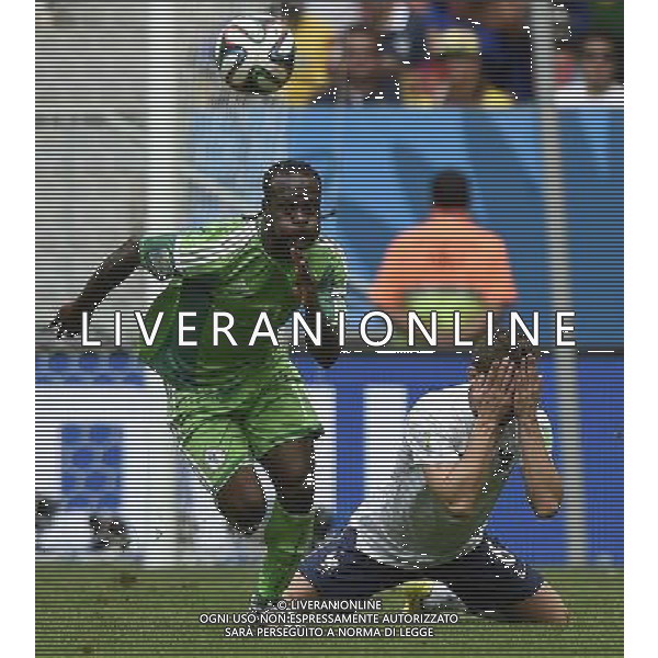 (140630) -- BRASILIA, June 30, 2014 () -- France\'s Yohan Cabaye vies with Nigeria\'s Victor Moses during a Round of 16 match between France and Nigeria of 2014 FIFA World Cup at the Estadio Nacional Stadium in Brasilia, Brazil, on June 30, 2014. France won 2-0 over Nigeria and qualified for quarter-finals here on Monday. (/Qi Heng)(rh) ©photoshot/Agenzia Aldo Liverani sas - ITALY ONLY - EDITORIAL USE ONLY