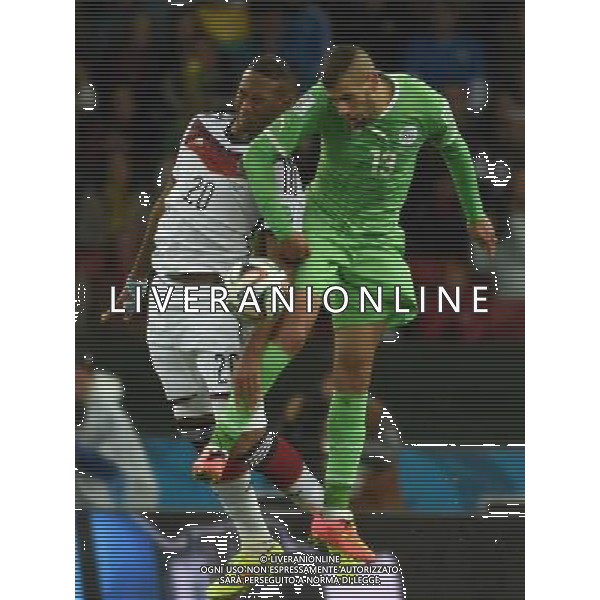 (140630) -- PORTO ALEGRE, June 30, 2014 () -- Algeria\'s Islam Slimani (R) vies with Germany\'s Jerome Boateng during a Round of 16 match between Germany and Algeria of 2014 FIFA World Cup at the Estadio Beira-Rio Stadium in Porto Alegre, Brazil, on June 30, 2014. Germany won 2-1 over Algeria after 120 minutes and qualified for quarter-finals on Monday. (/Li Ga)(pcy) ©photoshot/Agenzia Aldo Liverani sas - ITALY ONLY - EDITORIAL USE ONLY