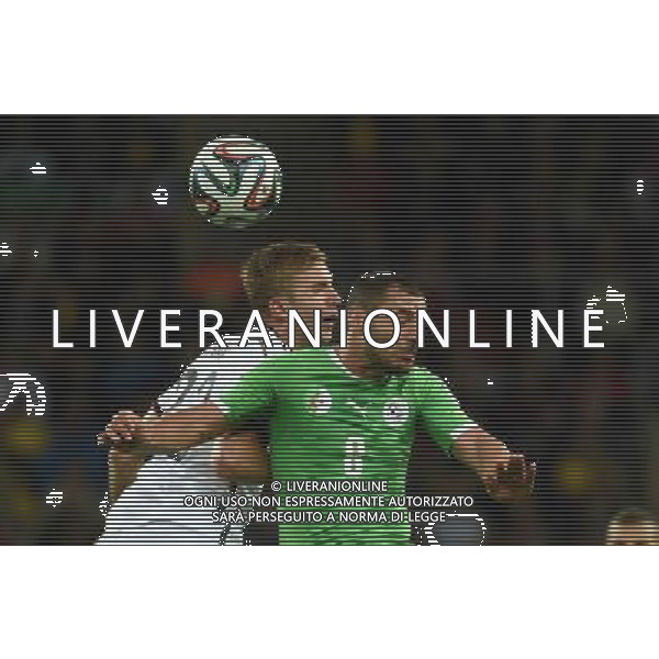 (140630) -- PORTO ALEGRE, June 30, 2014 () -- Algeria\'s Medhi Lacen (R) vies with Germany\'s Christoph Kramer during a Round of 16 match between Germany and Algeria of 2014 FIFA World Cup at the Estadio Beira-Rio Stadium in Porto Alegre, Brazil, on June 30, 2014. Germany won 2-1 over Algeria after 120 minutes and qualified for quarter-finals on Monday. (/Li Ga)(pcy) ©photoshot/Agenzia Aldo Liverani sas - ITALY ONLY - EDITORIAL USE ONLY