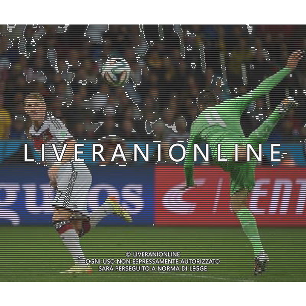 (140630) -- PORTO ALEGRE, June 30, 2014 () -- Algeria\'s Essaid Belkalem (R) vies with Germany\'s Bastian Schweinsteiger during a Round of 16 match between Germany and Algeria of 2014 FIFA World Cup at the Estadio Beira-Rio Stadium in Porto Alegre, Brazil, on June 30, 2014. Germany won 2-1 over Algeria after 120 minutes and qualified for quarter-finals on Monday. (/Li Ga)(pcy) ©photoshot/Agenzia Aldo Liverani sas - ITALY ONLY - EDITORIAL USE ONLY