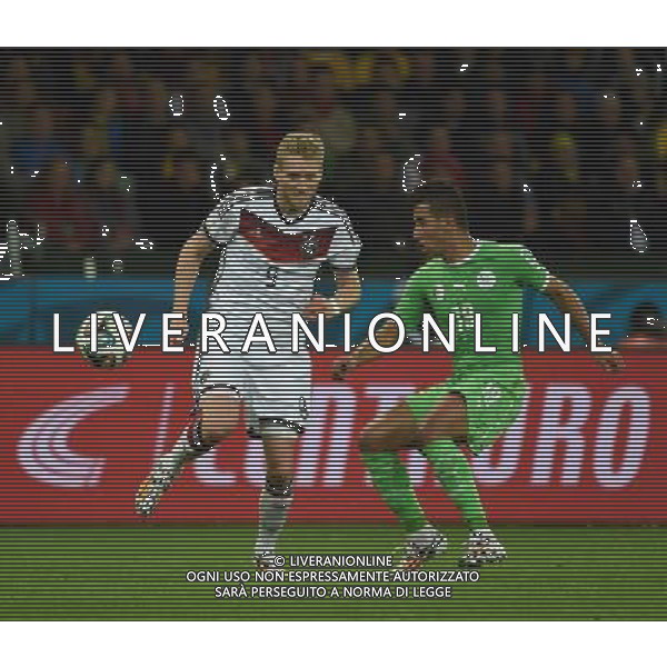 (140630) -- PORTO ALEGRE, June 30, 2014 () -- Algeria\'s Saphir Taider (R) vies with Germany\'s Andre Schurrle during a Round of 16 match between Germany and Algeria of 2014 FIFA World Cup at the Estadio Beira-Rio Stadium in Porto Alegre, Brazil, on June 30, 2014. Germany won 2-1 over Algeria after 120 minutes and qualified for quarter-finals on Monday. (/Li Ga)(pcy) ©photoshot/Agenzia Aldo Liverani sas - ITALY ONLY - EDITORIAL USE ONLY