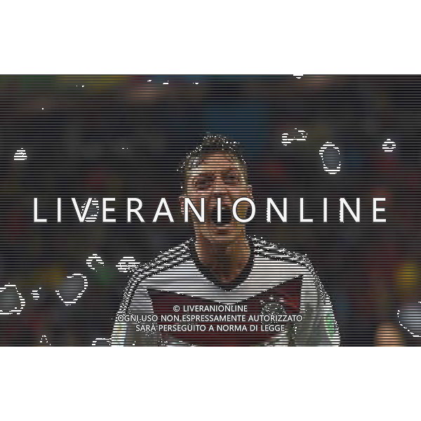 (140630) -- PORTO ALEGRE, June 30, 2014 () -- Germany\'s Mesut Ozil celebrates a goal during the extra time of a Round of 16 match between Germany and Algeria of 2014 FIFA World Cup at the Estadio Beira-Rio Stadium in Porto Alegre, Brazil, on June 30, 2014. Germany won 2-1 over Algeria after 120 minutes and qualified for quarter-finals on Monday. (/Li Ga)(pcy) ©photoshot/Agenzia Aldo Liverani sas - ITALY ONLY - EDITORIAL USE ONLY