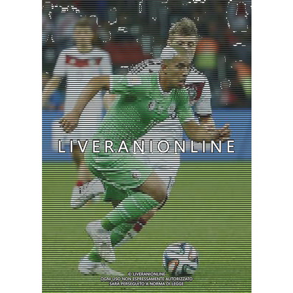 (140630) -- PORTO ALEGRE, June 30, 2014 () -- Algeria\'s Sofiane Feghouli runs with the ball during a Round of 16 match between Germany and Algeria of 2014 FIFA World Cup at the Estadio Beira-Rio Stadium in Porto Alegre, Brazil, on June 30, 2014. Germany won 2-1 over Algeria after 120 minutes and qualified for quarter-finals on Monday. (/Chen Jianli)(rh) ©photoshot/Agenzia Aldo Liverani sas - ITALY ONLY - EDITORIAL USE ONLY