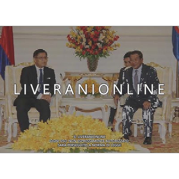 (140701) -- PHNOM PENH, July 1, 2014 () -- Cambodian Prime Minister Hun Sen (R) meets with visiting Thai foreign affairs ministry permanent secretary Sihasak Phuangketkeow, in Phnom Penh, Cambodia, July 1, 2014. Hun Sen met Tuesday with Sihasak Phuangketkeow to discuss current situation in Thailand and cooperation over migrant workers. (/Sovannara) ©photoshot/Agenzia Aldo Liverani sas - ITALY ONLY - EDITORIAL USE ONLY