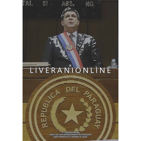 (140701) -- ASUNCION, July 1, 2014 () -- Paraguayan President Horacio Cartes presents his first government report at the head of Executive Power before the Congress Plenary, which marks the beginning of a new parliamentary period, in Asuncion, capital of Paraguay, on July 1, 2014. Paraguayan President stressed his Government\'s main actions based on three axes, \'Fight against Poverty, Economic Growth and Reintegration from Paraguay to the World\', according to local press. (/Marcelo Espinosa) (jg) (sp) ©PHOTOSHOT/Agenzia Aldo Liverani sas - ITALY ONLY - EDITORIAL USE ONLY - Il presidente del Paraguay Horacio Cards presenta il suo primo rapporto del governo a capo del potere esecutivo prima della plenaria del Congresso a Asuncion, capitale del Paraguay, il 1 luglio 2014