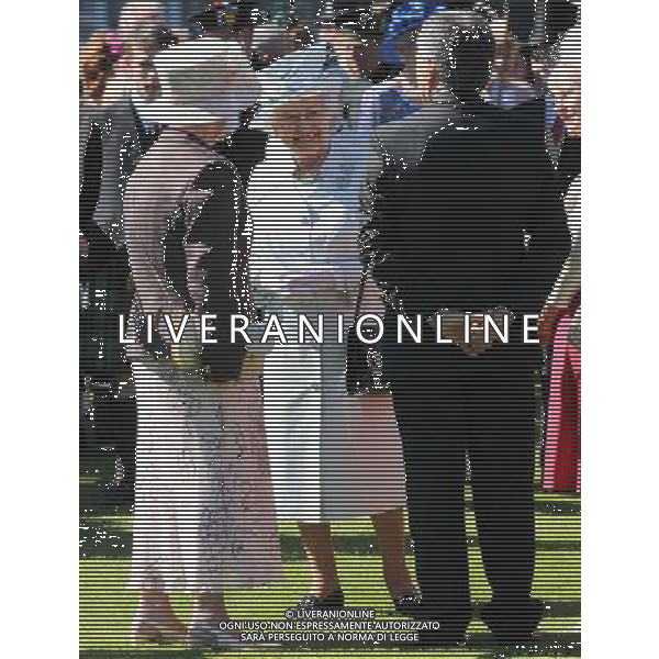 Queen Elizabeth II speaks to guests as she hosts a garden party at the Palace of Holyrood house in Edinburgh. ©PHOTOSHOT /Agenzia Aldo Liverani sas - ITALY ONLY - EDITORIAL USE ONLY