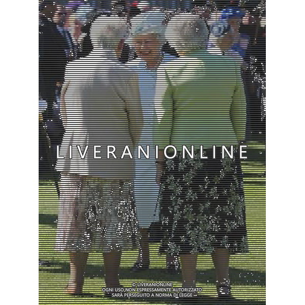 Queen Elizabeth II speaks to guests as she hosts a garden party at the Palace of Holyrood house in Edinburgh. ©PHOTOSHOT /Agenzia Aldo Liverani sas - ITALY ONLY - EDITORIAL USE ONLY