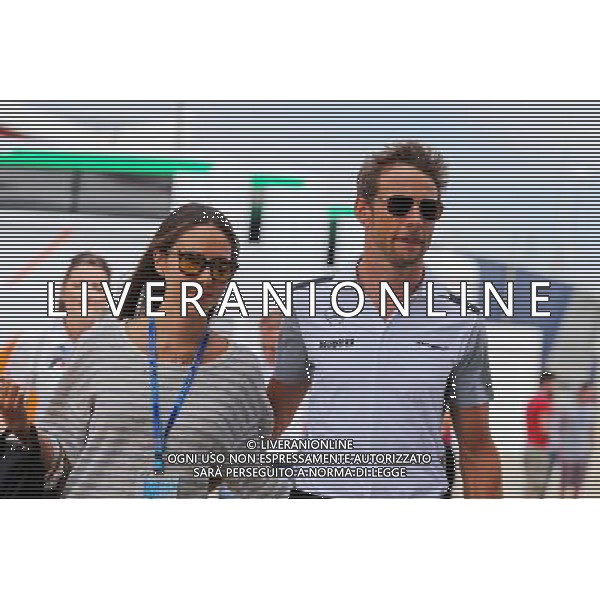 Jenson Button (GBR) McLaren with his girlfriend Jessica Michibata (JPN). 03.07.2014. Formula 1 World Championship, Rd 9, British Grand Prix, Silverstone, England, Preparation Day. - www.xpbimages.com, EMail: requests@xpbimages.com - copy of publication required for printed pictures. Every used picture is fee-liable. © Copyright: Moy / XPB Images AG ALDO LIVERANI SAS ONLY ITALY