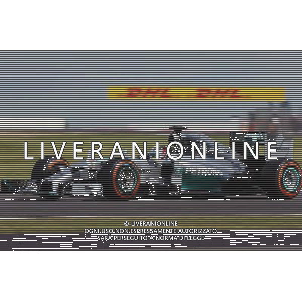 Lewis Hamilton (GBR) Mercedes AMG F1 W05. 04.07.2014. Formula 1 World Championship, Rd 9, British Grand Prix, Silverstone, England, Practice Day. - www.xpbimages.com, EMail: requests@xpbimages.com - copy of publication required for printed pictures. Every used picture is fee-liable. © Copyright: Moy / XPB Images /Agenzia Aldo Liverani sas - ITALY ONLY - Gp F1 Prove Libere Silverstone, Inghilterra