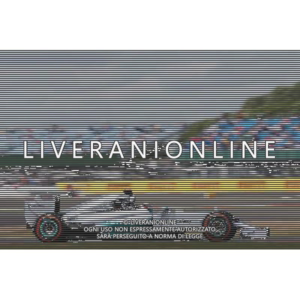 Lewis Hamilton (GBR) Mercedes AMG F1 W05. 04.07.2014. Formula 1 World Championship, Rd 9, British Grand Prix, Silverstone, England, Practice Day. - www.xpbimages.com, EMail: requests@xpbimages.com - copy of publication required for printed pictures. Every used picture is fee-liable. © Copyright: Moy / XPB Images /Agenzia Aldo Liverani sas - ITALY ONLY - Gp F1 Prove Libere Silverstone, Inghilterra