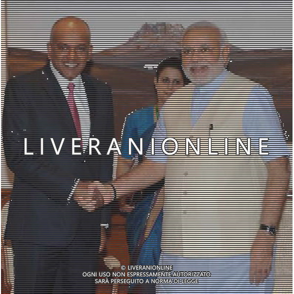 (140702) -- NEW DELHI, July 2, 2014 () -- Indian Prime Minister Narendra Modi (R) shakes hands with K. Shanmugam, Singaporean Minister for Foreign Affairs and Law, during a meeting in New Delhi, India, July 2, 2014. (/Press Information Bureau)(zhf) ©PHOTOSHOT /Agenzia Aldo Liverani sas - ITALY ONLY - EDITORIAL USE ONLY ©PHOTOSHOT/Agenzia Aldo Liverani sas - ITALY ONLY - EDITORIAL USE ONLY