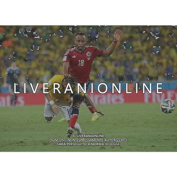 (140705) -- FORTALEZA, July 5, 2014 () -- Brazil\'s Neymar (L) is fouled by Juan Camilo Zuniga of Colombia during the quarterfinal match between Brazil and Colombia of 2014 Brazil FIFA World Cup at the Castelao Stadium, in Fortaleza, Brazil, on July 4, 2014. (/AGENCIA ESTADO) (sp) (dp) ***BRAZIL OUT*** AG ALDO LIVERANI SAS ONLY ITALY