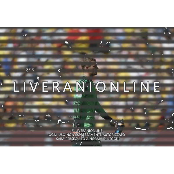 (140704) -- RIO DE JANEIRO, July 4, 2014 () -- Germany\'s goalkeeper Manuel Neuer leaves the field after a quarter-finals match between France and Germany of 2014 FIFA World Cup at the Estadio do Maracana Stadium in Rio de Janeiro, Brazil, on July 4, 2014. Germany won 1-0 over France and qualified for semi-finals on Friday.(/Wang Lili)(rh) AG ALDO LIVERANI SAS ONLY ITALY