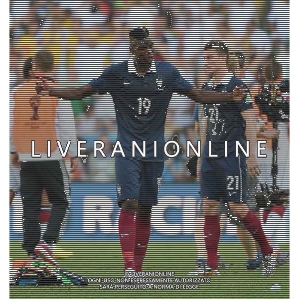 (140704) -- RIO DE JANEIRO, July 4, 2014 () -- France\'s Paul Pogba (C) reacts after a quarter-finals match between France and Germany of 2014 FIFA World Cup at the Estadio do Maracana Stadium in Rio de Janeiro, Brazil, on July 4, 2014. Germany won 1-0 over France and qualified for semi-finals on Friday.(/Wang Yuguo)(rh) AG ALDO LIVERANI SAS ONLY ITALY