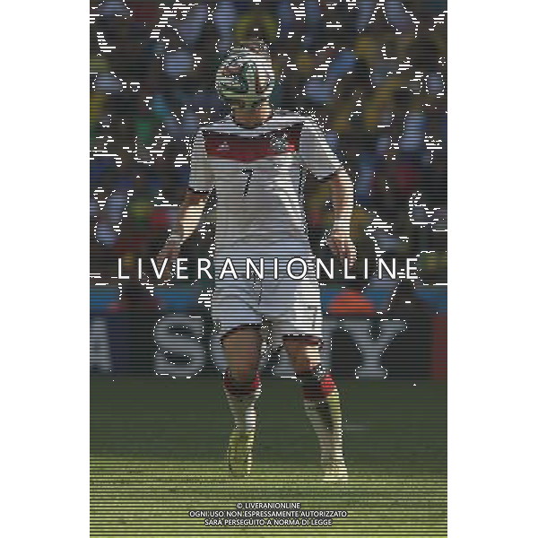 (140704) -- RIO DE JANEIRO, July 4, 2014 () -- Germany\'s Bastian Schweinsteiger vies for the ball during a quarter-finals match between France and Germany of 2014 FIFA World Cup at the Estadio do Maracana Stadium in Rio de Janeiro, Brazil, on July 4, 2014. Germany won 1-0 over France and qualified for semi-finals on Friday.(/Xu Zijian)(rh) AG ALDO LIVERANI SAS ONLY ITALY