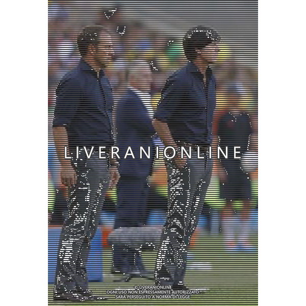 (140704) -- RIO DE JANEIRO, July 4, 2014 () -- Germany\'s coach Joachim Loew (R) looks on during a quarter-finals match between France and Germany of 2014 FIFA World Cup at the Estadio do Maracana Stadium in Rio de Janeiro, Brazil, on July 4, 2014. Germany won 1-0 over France and qualified for semi-finals on Friday.(/Wang Lili)(rh) AG ALDO LIVERANI SAS ONLY ITALY
