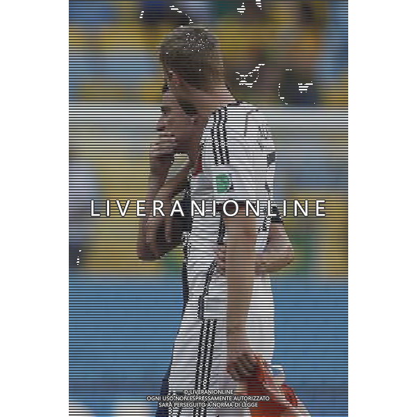 (140704) -- RIO DE JANEIRO, July 4, 2014 () -- France\'s Laurent Koscielny talks with Germany\'s Per Mertesacker after a quarter-finals match between France and Germany of 2014 FIFA World Cup at the Estadio do Maracana Stadium in Rio de Janeiro, Brazil, on July 4, 2014. Germany won 1-0 over France and qualified for semi-finals on Friday.(/Wang Lili)(rh) AG ALDO LIVERANI SAS ONLY ITALY