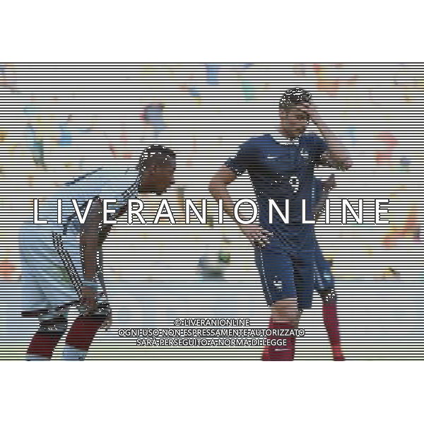 (140704) -- RIO DE JANEIRO, July 4, 2014 () -- France\'s Olivier Giroud (R) reacts after a quarter-finals match between France and Germany of 2014 FIFA World Cup at the Estadio do Maracana Stadium in Rio de Janeiro, Brazil, on July 4, 2014. Germany won 1-0 over France and qualified for semi-finals on Friday.(/Wang Yuguo)(rh) AG ALDO LIVERANI SAS ONLY ITALY
