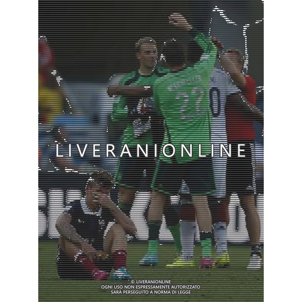 (140704) -- RIO DE JANEIRO, July 4, 2014 () -- France\'s Lucas Digne (down) sits on the field after a quarter-finals match between France and Germany of 2014 FIFA World Cup at the Estadio do Maracana Stadium in Rio de Janeiro, Brazil, on July 4, 2014. Germany won 1-0 over France and qualified for semi-finals on Friday.(/Wang Lili)(rh) AG ALDO LIVERANI SAS ONLY ITALY