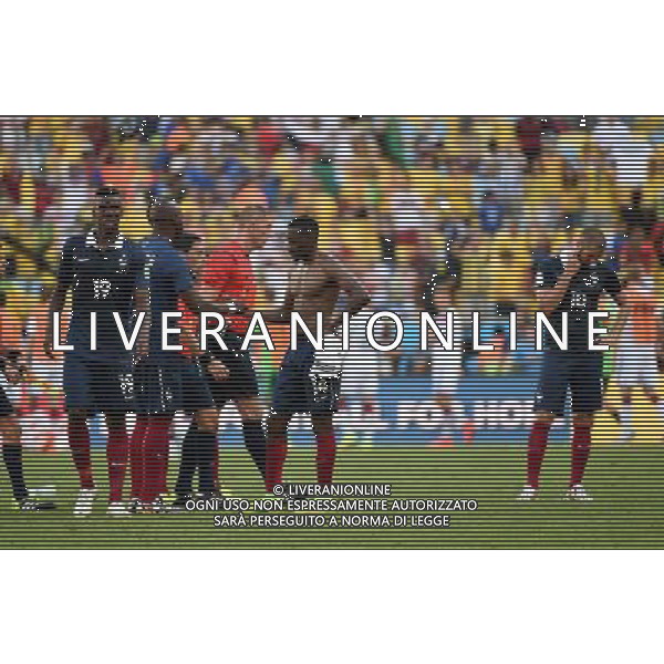 (140704) -- RIO DE JANEIRO, July 4, 2014 () -- France\'s players react after a quarter-finals match between France and Germany of 2014 FIFA World Cup at the Estadio do Maracana Stadium in Rio de Janeiro, Brazil, on July 4, 2014. Germany won 1-0 over France and qualified for semi-finals on Friday.(/Wang Yuguo)(rh) AG ALDO LIVERANI SAS ONLY ITALY