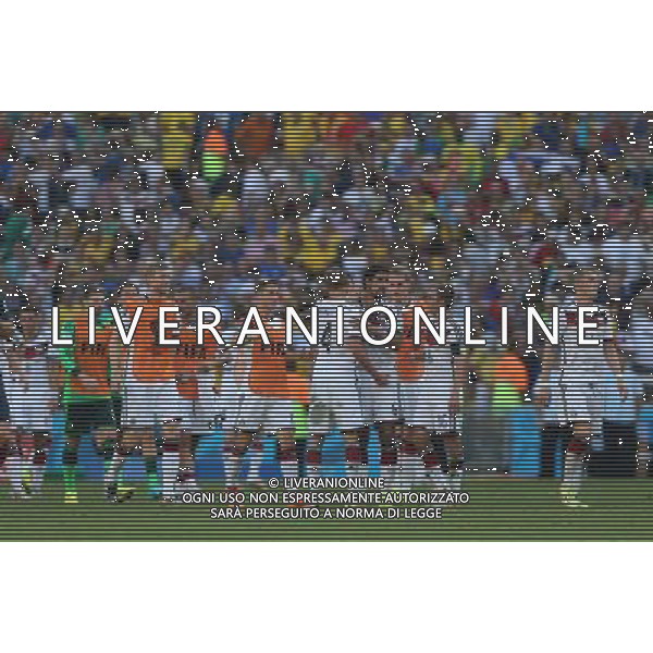 (140704) -- RIO DE JANEIRO, July 4, 2014 () -- Germany\'s players celebrate the victory after a quarter-finals match between France and Germany of 2014 FIFA World Cup at the Estadio do Maracana Stadium in Rio de Janeiro, Brazil, on July 4, 2014. Germany won 1-0 over France and qualified for semi-finals on Friday.(/Xu Zijian)(rh) AG ALDO LIVERANI SAS ONLY ITALY