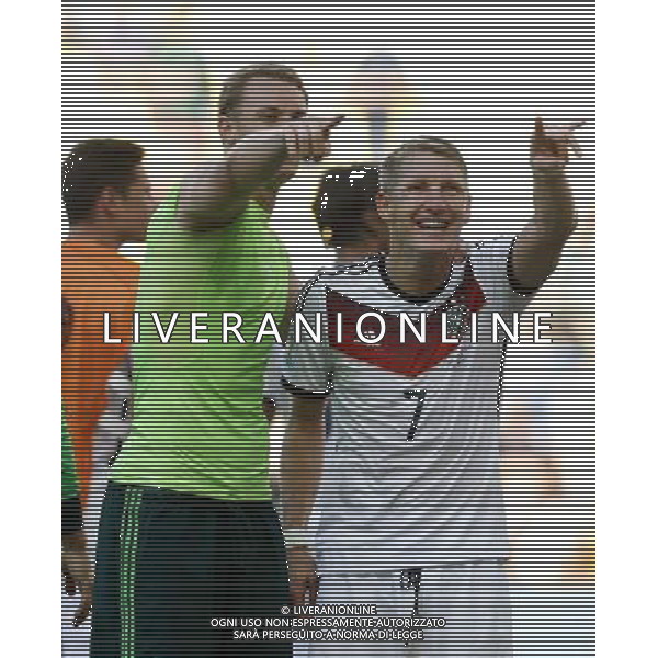 (140704) -- RIO DE JANEIRO, July 4, 2014 () -- Germany\'s goalkeeper Manuel Neuer (L) and Bastian Schweinsteiger celebrate the victory after a quarter-finals match between France and Germany of 2014 FIFA World Cup at the Estadio do Maracana Stadium in Rio de Janeiro, Brazil, on July 4, 2014. Germany won 1-0 over France and qualified for semi-finals on Friday.(/Wang Lili)(rh) AG ALDO LIVERANI SAS ONLY ITALY