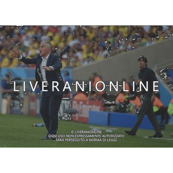 (140704) -- RIO DE JANEIRO, July 4, 2014 () -- France\'s coach Didier Deschamps (L) reacts during a quarter-finals match between France and Germany of 2014 FIFA World Cup at the Estadio do Maracana Stadium in Rio de Janeiro, Brazil, on July 4, 2014. Germany won 1-0 over France and qualified for semi-finals on Friday.(/Wang Yuguo)(rh) AG ALDO LIVERANI SAS ONLY ITALY