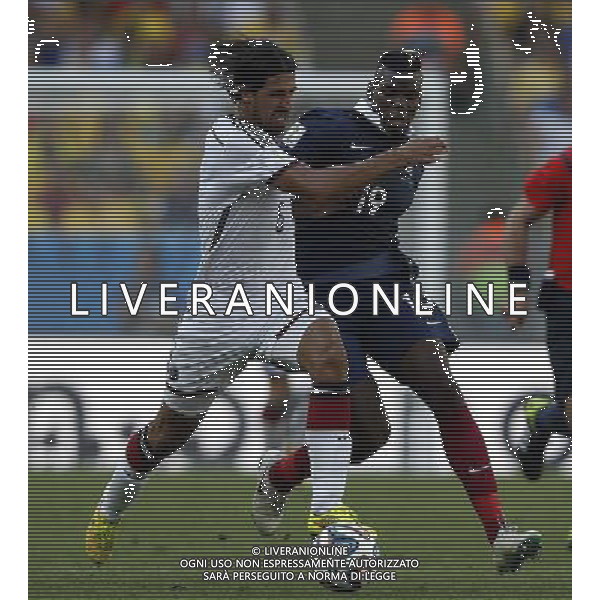 (140704) -- RIO DE JANEIRO, July 4, 2014 () -- Germany\'s Sami Khedira (L) vies with France\'s Paul Pogba during a quarter-finals match between France and Germany of 2014 FIFA World Cup at the Estadio do Maracana Stadium in Rio de Janeiro, Brazil, on July 4, 2014. Germany won 1-0 over France and qualified for semi-finals on Friday. (/Wang Lili)(pcy) AG ALDO LIVERANI SAS ONLY ITALY