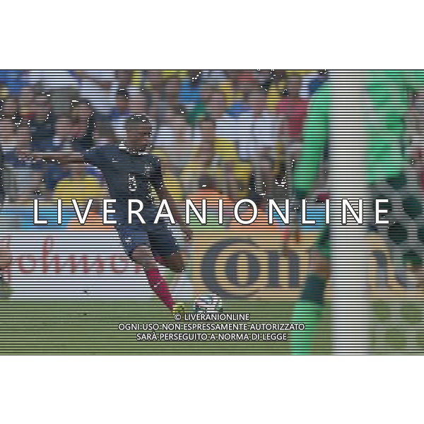 (140704) -- RIO DE JANEIRO, July 4, 2014 () -- France\'s Patrice Evra shoots the ball during a quarter-finals match between France and Germany of 2014 FIFA World Cup at the Estadio do Maracana Stadium in Rio de Janeiro, Brazil, on July 4, 2014. Germany won 1-0 over France and qualified for semi-finals on Friday.(/Xu Zijian)(rh) AG ALDO LIVERANI SAS ONLY ITALY