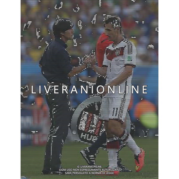 (140704) -- RIO DE JANEIRO, July 4, 2014 () -- Germany\'s coach Joachim Loew (L) shakes hands with Miroslav Klose after being replaced during a quarter-finals match between France and Germany of 2014 FIFA World Cup at the Estadio do Maracana Stadium in Rio de Janeiro, Brazil, on July 4, 2014.(/Wang Lili)(pcy) AG ALDO LIVERANI SAS ONLY ITALY