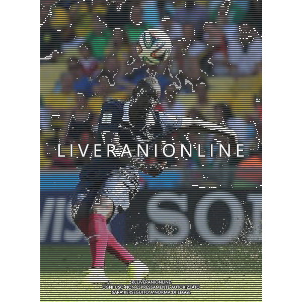 (140704) -- RIO DE JANEIRO, July 4, 2014 () -- France\'s Mamadou Sakho passes the ball during a quarter-finals match between France and Germany of 2014 FIFA World Cup at the Estadio do Maracana Stadium in Rio de Janeiro, Brazil, on July 4, 2014.(/Xu Zijian)(rh) AG ALDO LIVERANI SAS ONLY ITALY