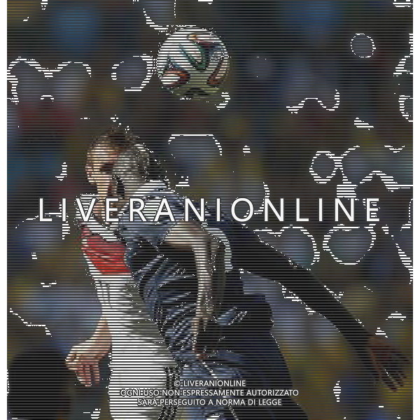 (140704) -- RIO DE JANEIRO, July 4, 2014 () -- Germany\'s Thomas Muller (L) competes for a header with France\'s Mamadou Sakho during a quarter-finals match between France and Germany of 2014 FIFA World Cup at the Estadio do Maracana Stadium in Rio de Janeiro, Brazil, on July 4, 2014.(/Wang Lili)(pcy) AG ALDO LIVERANI SAS ONLY ITALY