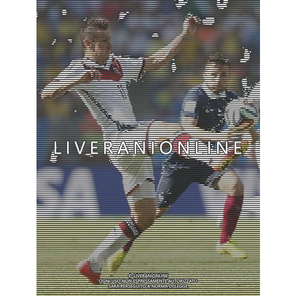 (140704) -- RIO DE JANEIRO, July 4, 2014 () -- Germany\'s Miroslav Klose (L) competes during a quarter-finals match between France and Germany of 2014 FIFA World Cup at the Estadio do Maracana Stadium in Rio de Janeiro, Brazil, on July 4, 2014.(/Wang Lili)(pcy) AG ALDO LIVERANI SAS ONLY ITALY