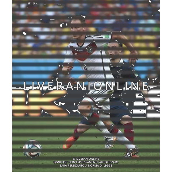 (140704) -- RIO DE JANEIRO, July 4, 2014 () -- Germany\'s Benedikt Howedes runs with the ball during a quarter-finals match between France and Germany of 2014 FIFA World Cup at the Estadio do Maracana Stadium in Rio de Janeiro, Brazil, on July 4, 2014.(/Wang Yuguo)(rh) AG ALDO LIVERANI SAS ONLY ITALY