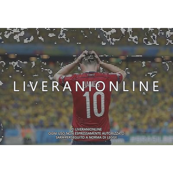 (140704) -- FORTALEZA, July 4, 2014 () -- Colombia\'s James Rodriguez reacts during a quarter-finals match between Brazil and Colombia of 2014 FIFA World Cup at the Estadio Castelao Stadium in Fortaleza, Brazil, on July 4, 2014. Brazil won 2-1 over Colombia and qualified for semi-finals on Friday. (/Zhou Lei)(rh) AG ALDO LIVERANI SAS ONLY ITALY
