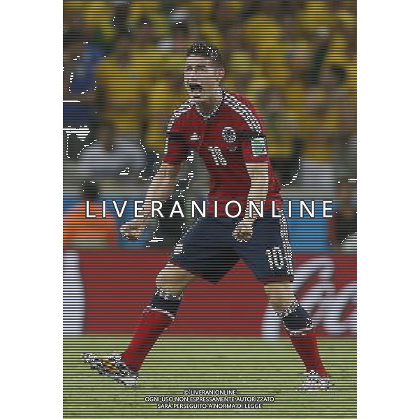(140704) -- FORTALEZA, July 4, 2014 () -- Colombia\'s James Rodriguez celebrates his penalty goal during a quarter-finals match between Brazil and Colombia of 2014 FIFA World Cup at the Estadio Castelao Stadium in Fortaleza, Brazil, on July 4, 2014. Brazil won 2-1 over Colombia and qualified for semi-finals on Friday. (/Zhou Lei)(rh) AG ALDO LIVERANI SAS ONLY ITALY