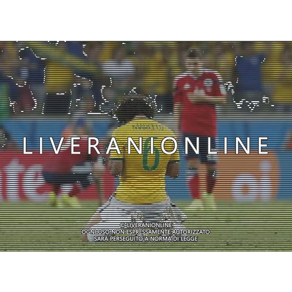 (140704) -- FORTALEZA, July 4, 2014 () -- Brazil\'s Marcelo celebrates the victory after a quarter-finals match between Brazil and Colombia of 2014 FIFA World Cup at the Estadio Castelao Stadium in Fortaleza, Brazil, on July 4, 2014. Brazil won 2-1 over Colombia and qualified for semi-finals on Friday. (/Zhou Lei)(rh) AG ALDO LIVERANI SAS ONLY ITALY
