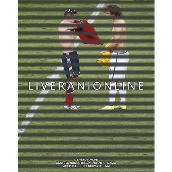 (140704) -- FORTALEZA, July 4, 2014 () -- Colombia\'s James Rodriguez (L) and Brazil\'s David Luiz exchange their jerseys after a quarter-finals match between Brazil and Colombia of 2014 FIFA World Cup at the Estadio Castelao Stadium in Fortaleza, Brazil, on July 4, 2014. Brazil won 2-1 over Colombia and qualified for semi-finals on Friday. (/Liao Yujie)(pcy) AG ALDO LIVERANI SAS ONLY ITALY