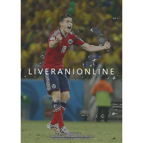 (140704) -- FORTALEZA, July 4, 2014 () -- Colombia\'s James Rodriguez celebrates a penalty goal during a quarter-finals match between Brazil and Colombia of 2014 FIFA World Cup at the Estadio Castelao Stadium in Fortaleza, Brazil, on July 4, 2014. Brazil won 2-1 over Colombia and qualified for semi-finals on Friday. (/Chen Jianli)(rh) AG ALDO LIVERANI SAS ONLY ITALY