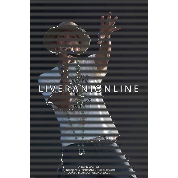 Grammy, BET Music and MTV Africa Music Award winning Pharrell Williams performing live in concert on the mains stage at Wireless 2014 LONDON, Friday, Day One at Finsbury Park, London, United Kingdom Date: 04/07/2014
